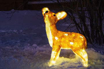 Lighting acrylic deer figurine, decoration of little reindeer illuminated in winter evening