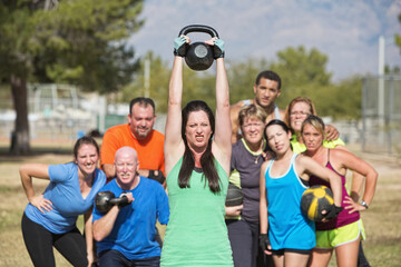 Woman Struggling with Weights