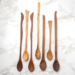 handmade wooden spoons on mable table