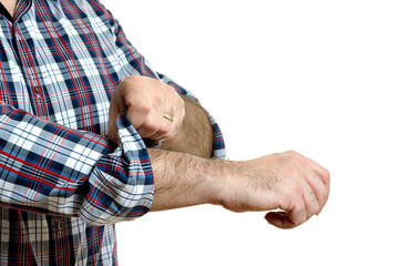 Man rolls up sleeves