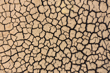 Dry lake bed with cracked Soil, Aerial view.