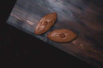 Delicious almond cookies on a wooden background. Tasty food