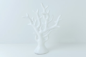 white tree on a light background, creative concept of autumn