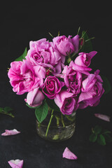 Small pink garden roses in vase