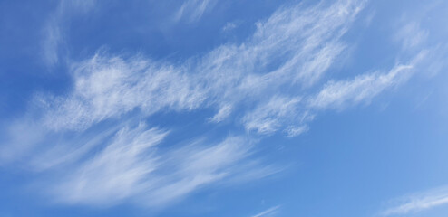 White clouds in the blue clear sky