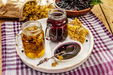 Elderberry tea from ripe berries and dried flowers