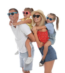 Happy family with children wearing sunglasses on white background
