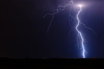 Naklejka na ściany i meble lightning bolt strike in a thunderstorm