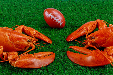 American football gsport game concept. Red lobsters with football ball.