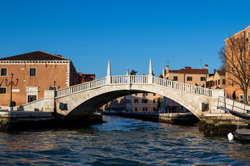 Fototapeta na wymiar Views across to a bridge alongside the Grand Canal 