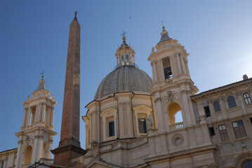 Obraz premium Obelisk and church of Sant Agnese in Agone at Piazza Navona Rome
