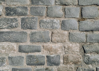 Texture of gray paving stones, top view.