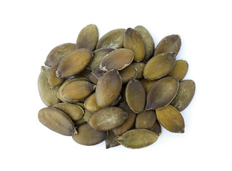 Peeled pumpkin seeds isolated on white, top view