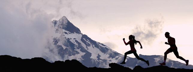 Panoramic banner of running people athletes sport fitness concept. Silhouette trail running in mountain summit background. Man and woman on run training outdoors active fit lifestyle.