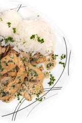 Creamy Herb Mushroom Chicken with steamed rice, dill and parsley on a half plate shot from above
