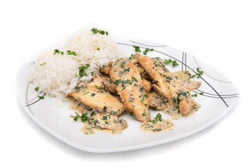 Creamy Herb Mushroom Chicken with steamed rice, dill and parsley on plate isolated on white background

