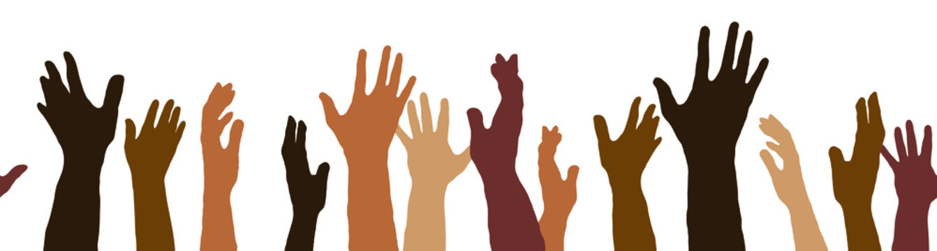 A racially diverse group of hands raised up.