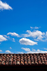 Roof and blue sky with clouds, Diamantina, Brazil