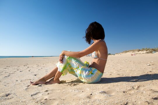 woman sitting at palmar beach