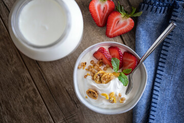 Healthy Breakfast - White Yogurt, Fresh Strawberries and Cereals. Top View. Copy Space.