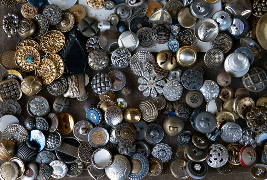 Assortment of buttons for sewing in a  button box