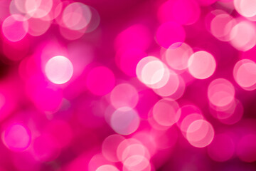 Bokeh abstract blur in pink valentine tone from street or road lights and car at night of the city...