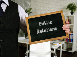 Public Relations sign on the piece of paper.