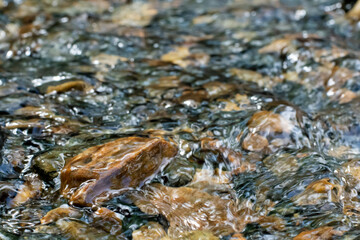 Running water through rocks
