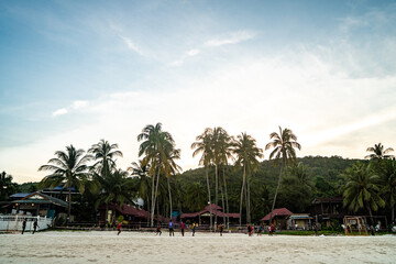Obraz premium September 23, 2020, Pulau Redang, Terengganu, Malaysia: The local people playing beach soccer at Pulau Redang during sunset