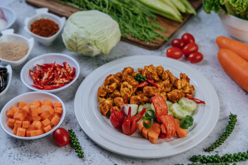 Herbs Fried chicken with Chili, Tomato, Cucumber, Carrot, and Fresh pepper.