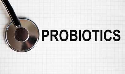 In the notebook is the inscription PROBIOTICS, rowos lies stethoscope.