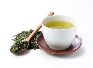Green tea and tea leaves on a white background - obrazy, fototapety, plakaty