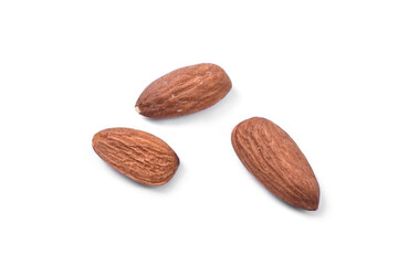 Three almonds on white background