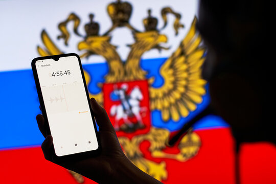 Russian Secret Service officer recording diplomatic conversations with special listening device