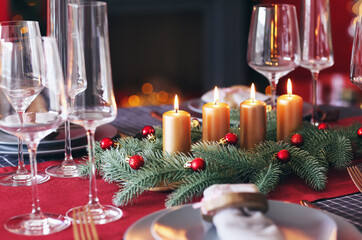 Beautiful table setting with Christmas decorations in living room