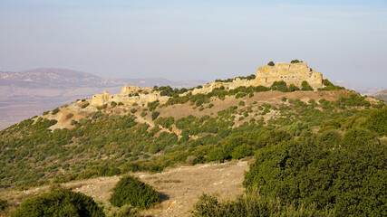 Early morning view north towards Nimrod Fortress with settlements along Israel/ Lebanon border in distance.