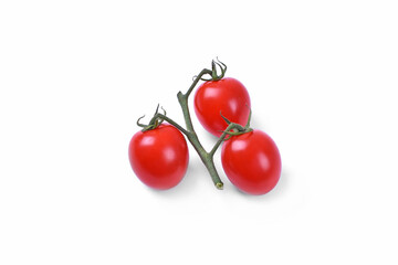 Three red cherry tomatoes on white background