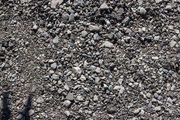 The texture of a country stone road. Background