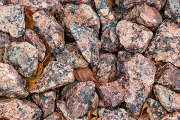 The texture of crushed stone of pink marine 