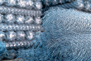 Rolls of steel wire mesh for construction work in warehouse
