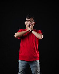 Young men in empty red T-shirts, stylish and posing like famous T-shirt models. Men's t-shirt template and mockup design for print.