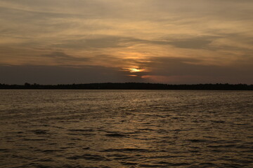 Fototapeta premium sunset over the river