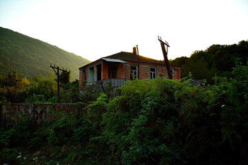 Fototapeta na wymiar a house in the mountains of abkhazia