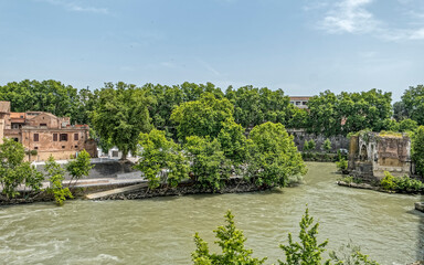 Fototapeta na wymiar ruins of the brocken and Palatino iron bridge on Tiber river, Rome Italy