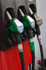Gasoline pumps nozzles at petrol station