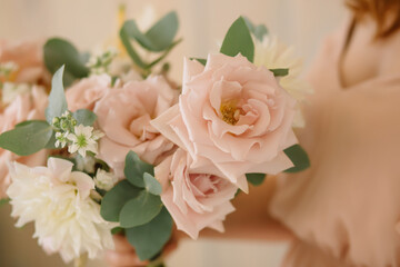 pink roses with flowers in a bouquet for a wedding
