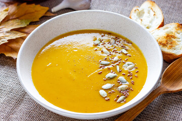 Healthy, vegan food. Pumpkin soup with pumpkin seeds
