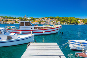 Fototapeta na wymiar Boats on waterfront in town of Mali Losinj on the island of Losinj, Adriatic coast in Croatia