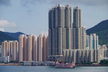Residential area in old apartment with windows. High-rise building, skyscraper with windows of...