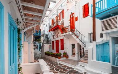 Old Traditional greek street of Mykonos with colourful houses, Greece - obrazy, fototapety, plakaty